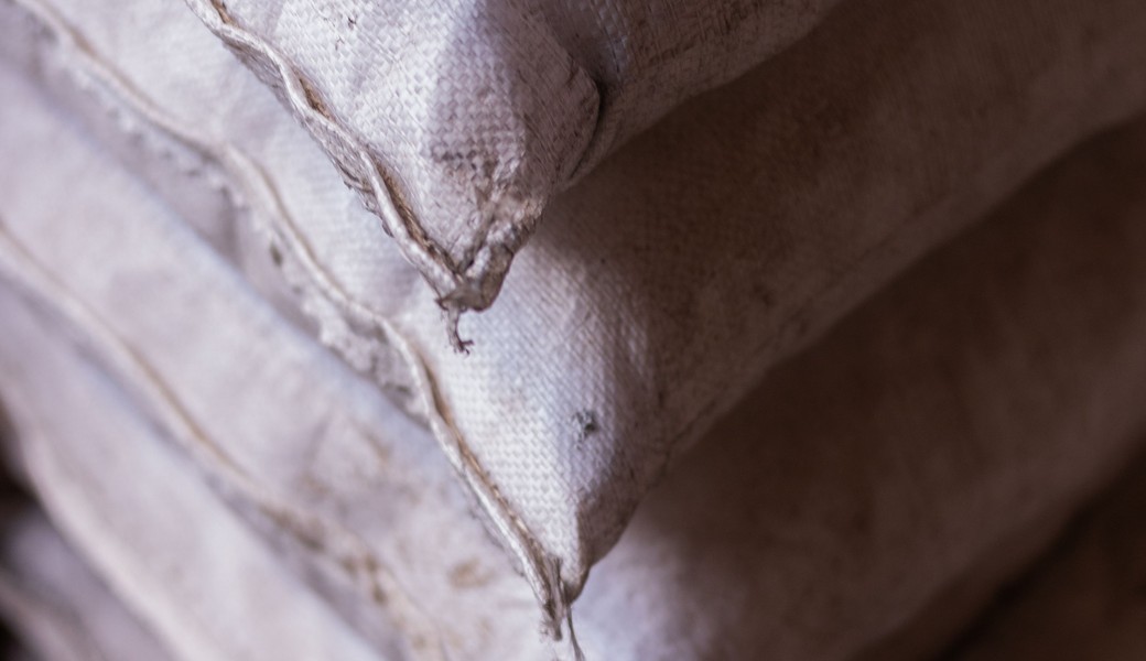 Feed raw materials in stacked 50 kg bags